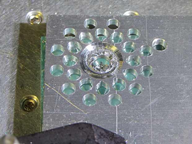 Can opener gear - first hole pattern