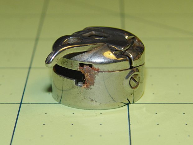 Kenmore bobbin case - rusted overview