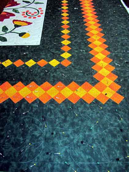 Quilt top with pins