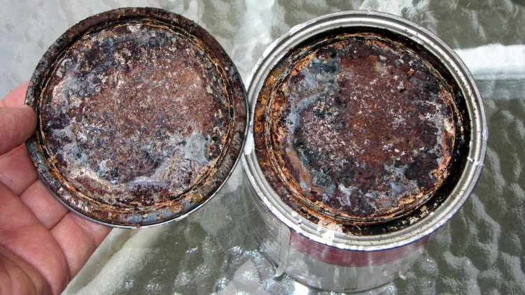 Paint can stored upside-down - interior