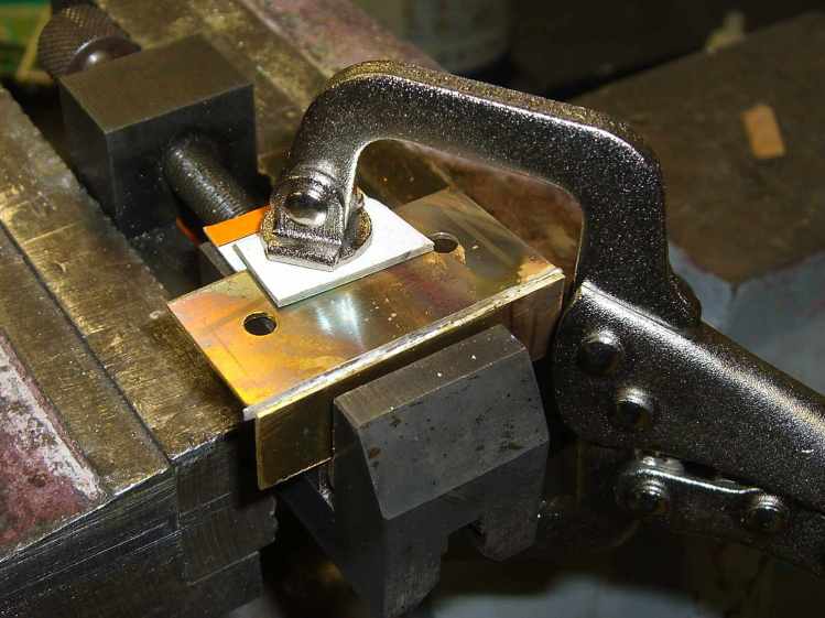 Brass switch bracket - clamped for soldering