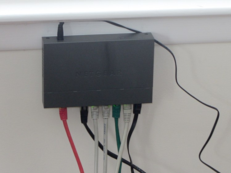 Netgear switch mounted