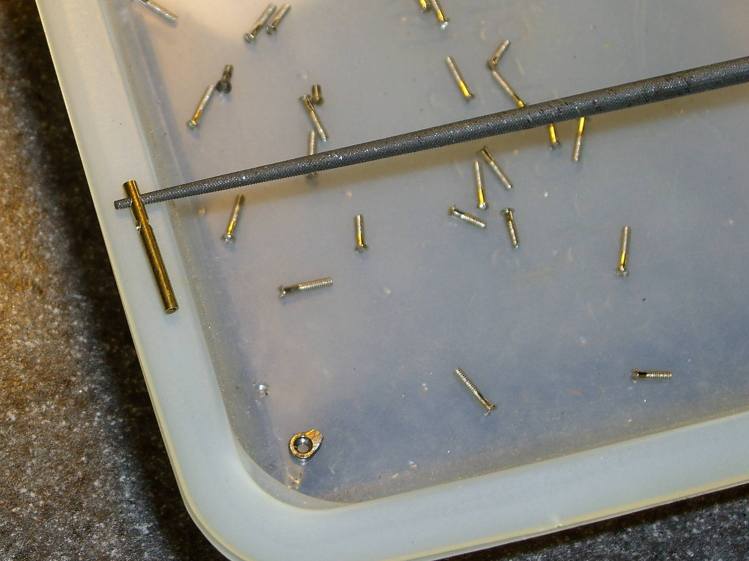 Silhouette temple repair - filing screw holes