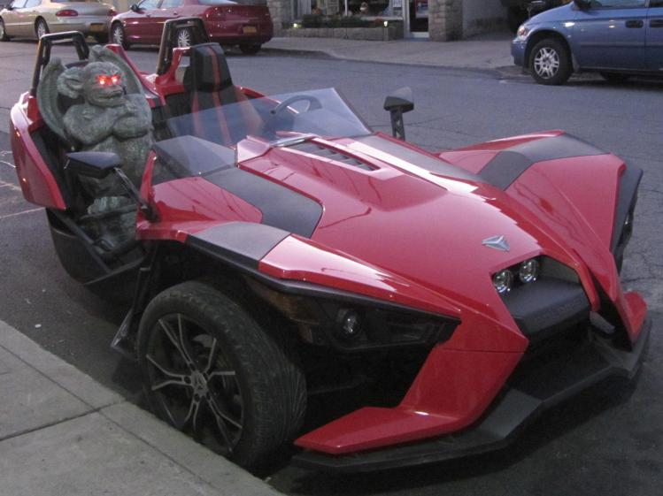 Trike vehicle with statue