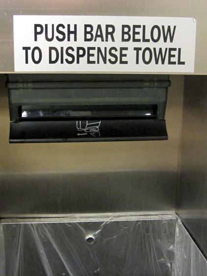 Towel dispenser - pictograph vs label