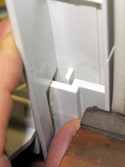 Refrigerator Drawer Strut Tab - alignment