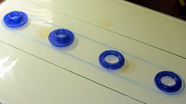 Fencing helmet grommet - manual sequential build