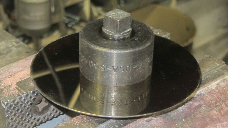 Greenlee puch on hard drive platter