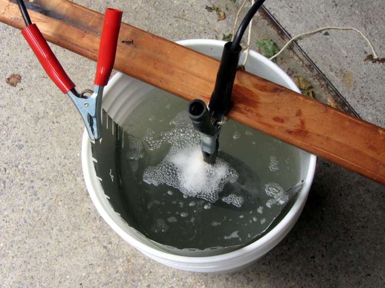 Cast iron pan electrolysis - bucket