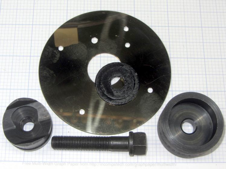 Hard drive platter - Greenlee punch bushing