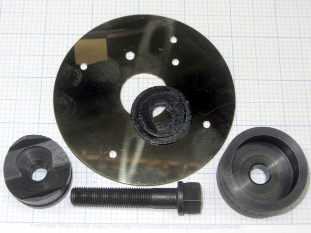 Hard drive platter - Greenlee punch bushing