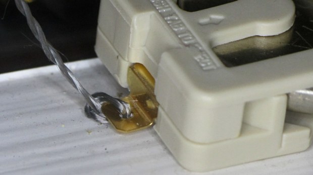 CR2032 - Stainless steel thread - knotted