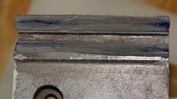 Tailstock way repair - V groove epoxy blued