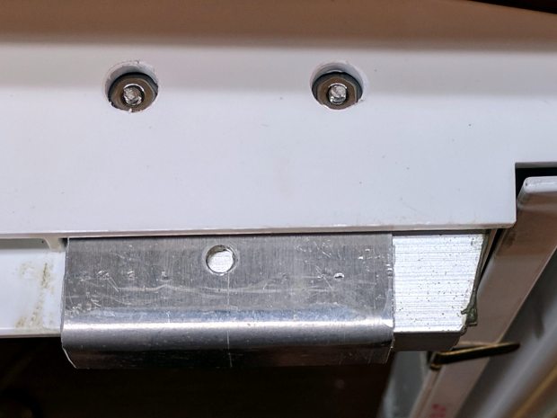 Refrigerator shelf slide - support screw nut openings