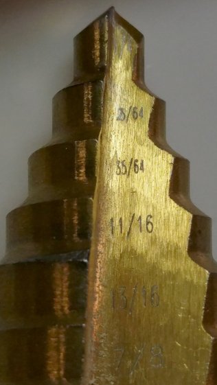 Quasi-inch step drill