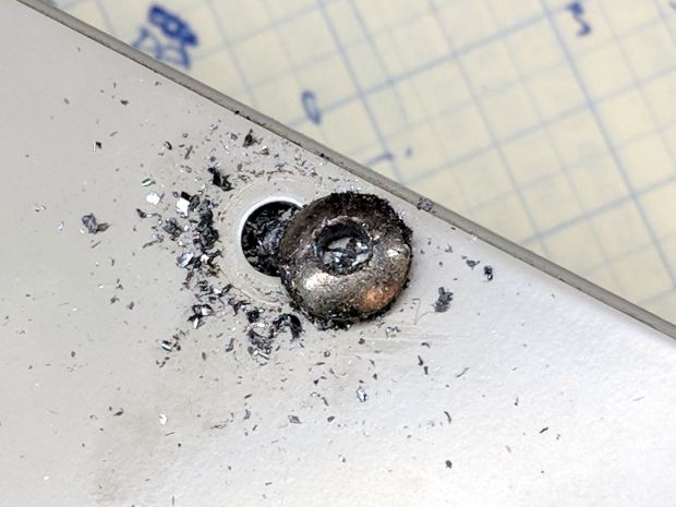 Drilled-out button screw head