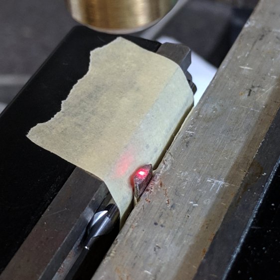 Toy lid lifter - laser alignment