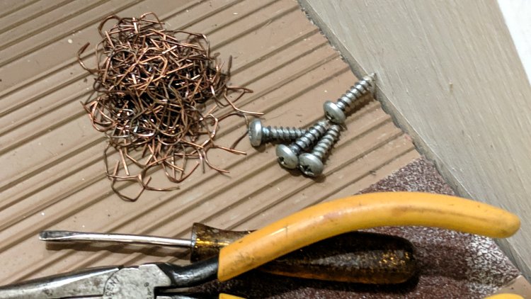 Chair reupholstering - staple pile