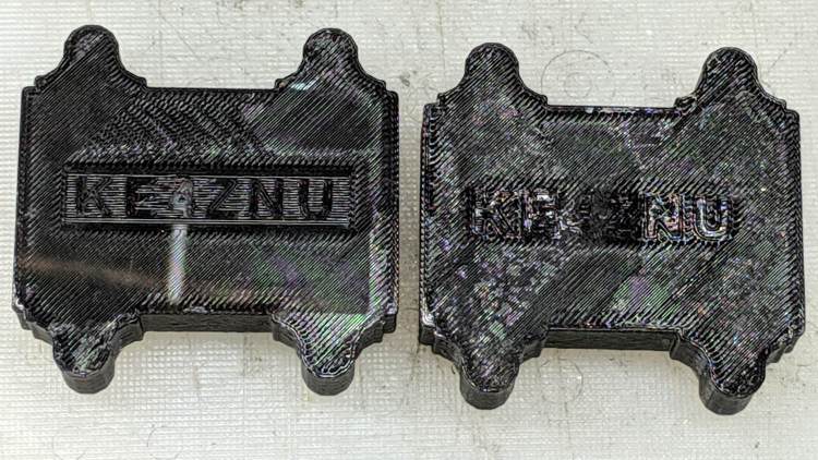 NP-BX1 battery holder - Raised vs Recessed Legend