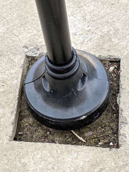 Round Lamp Post in Square Pavement Hole