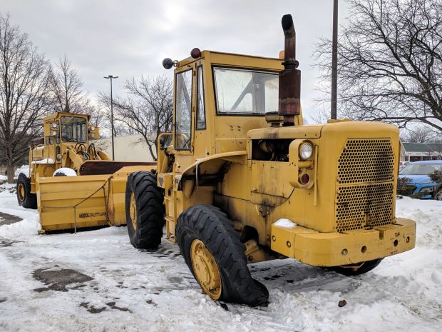 Front-end loader with flat tire