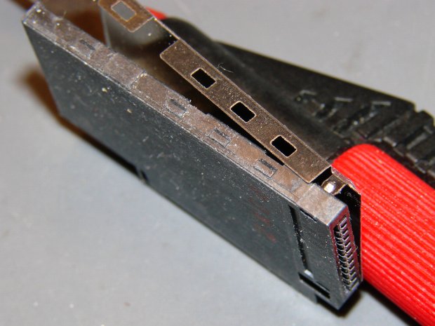 DSC-F717 - Memory Stick socket cover latches