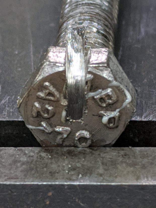 Cheese slicer - slotted bolt head