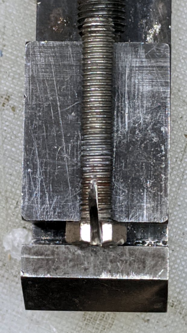 Cheese slicer - skewed slot