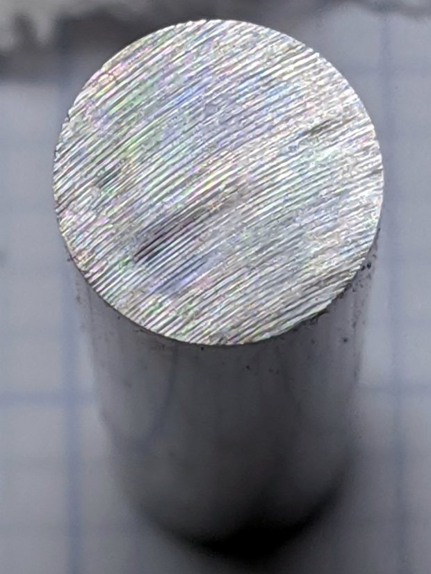 Hardened shaft facing - abrasive flattening