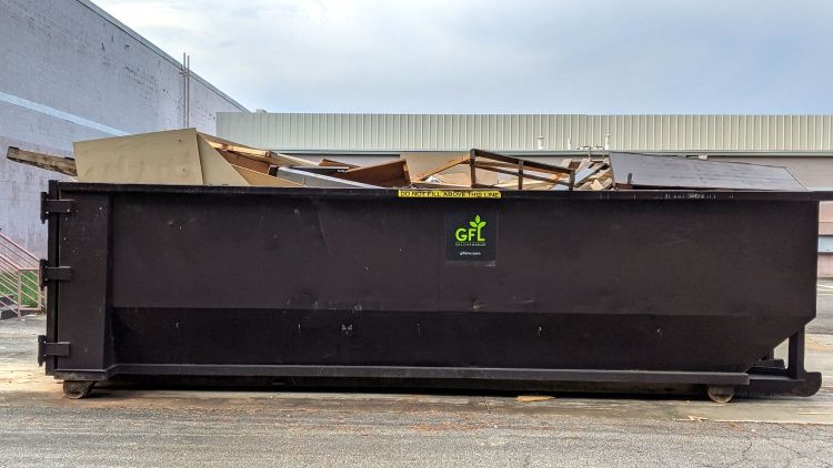 Overloaded dumpster