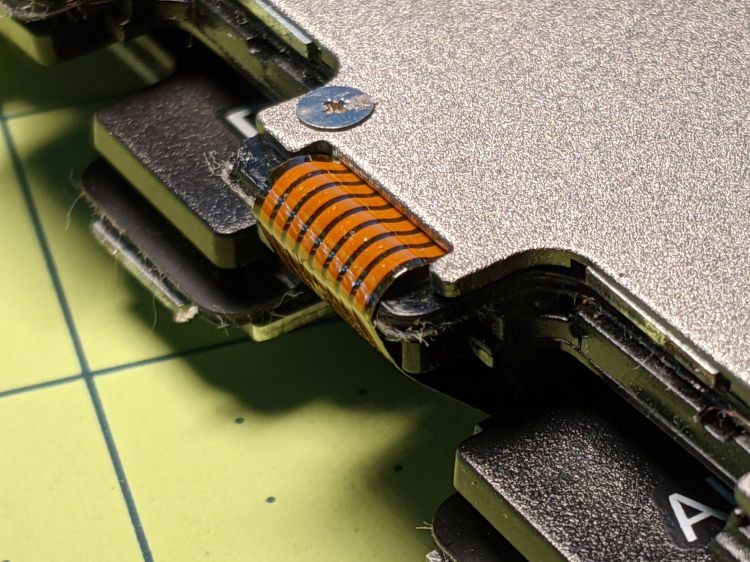 Folding keyboard - acute cable fold edge