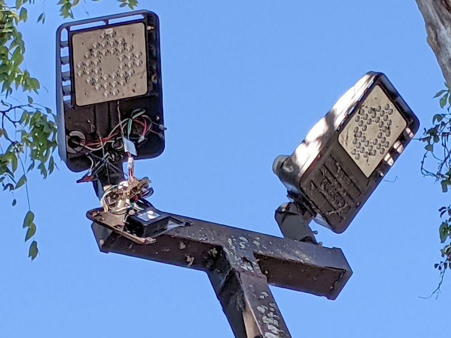 Disemboweled parking lot light