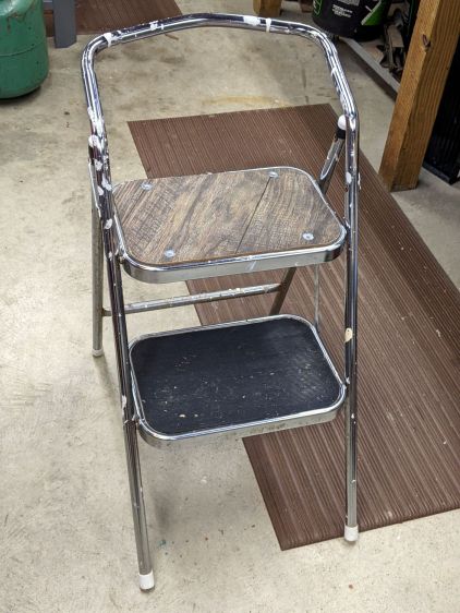 Folding step stool - reseated