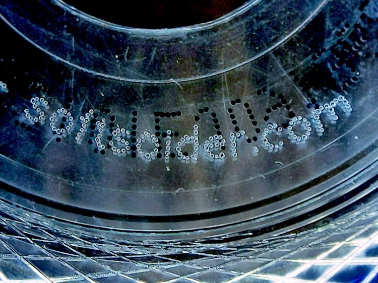 Laser-engraved DVD - dot-mode text detail