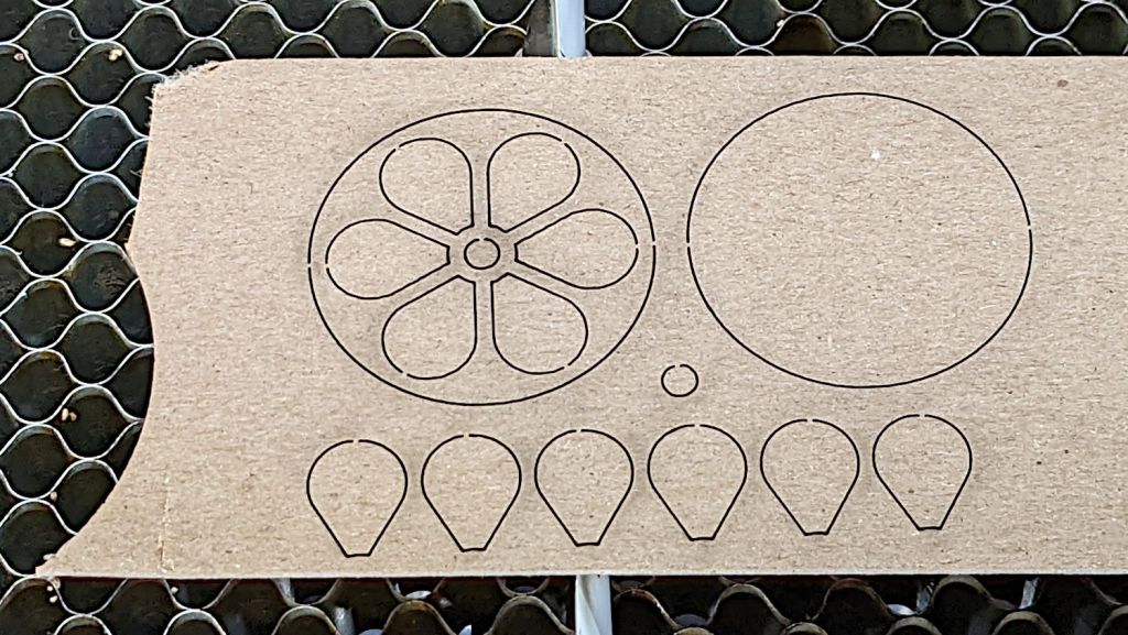 Laser-Cut Coaster Kerf Compensation