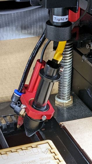 Detached laser lens holder