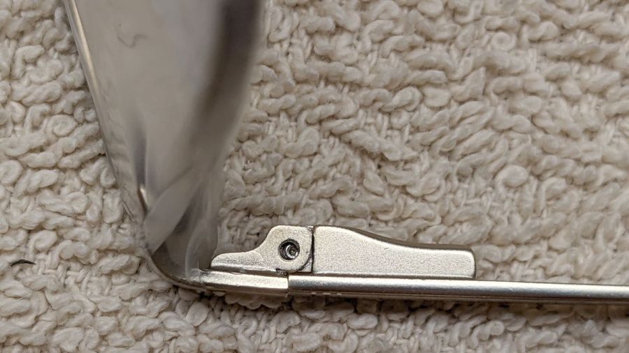 Eyeglass spring temple - screw misalignment