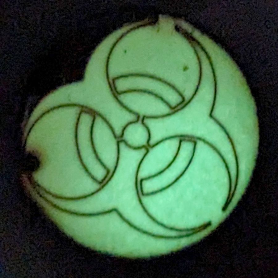 Biohazard earring - GITD tape glow