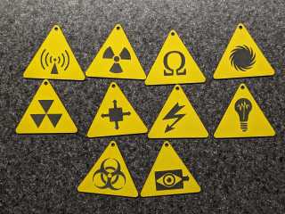 Danger Zone Earrings: Engraved Trolase