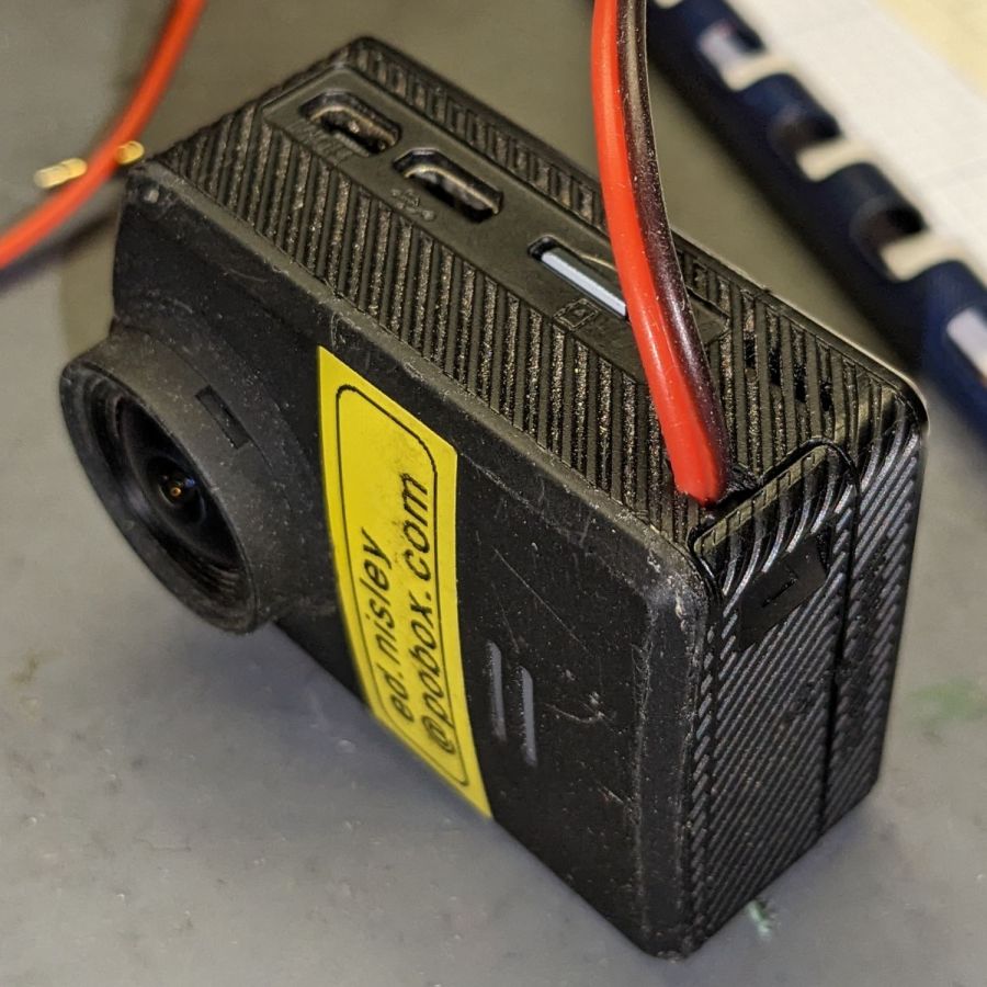 SJCAM M20 Battery Replacement - camera cable exit