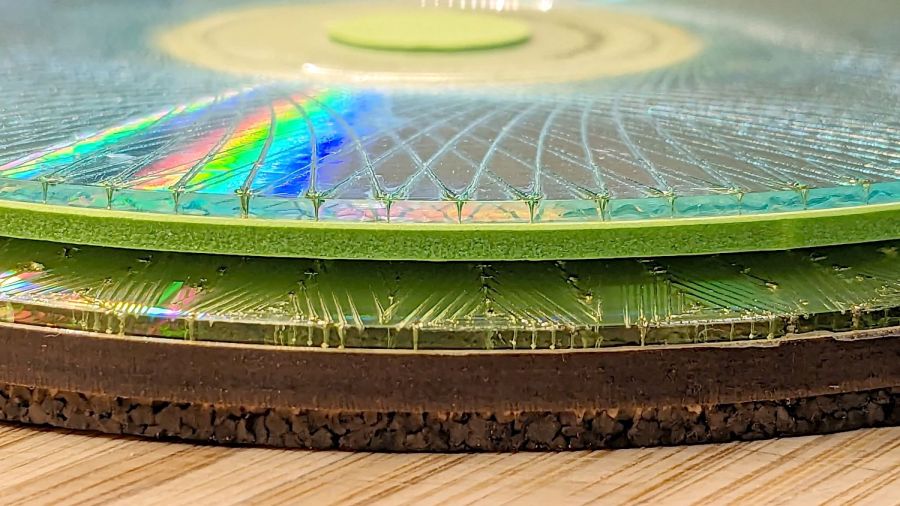 Laser cut CDs - Foam vs MDF-cork backing - detail