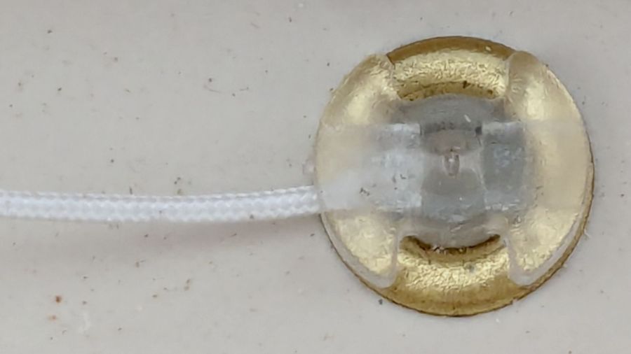 Cellular shade - grommet