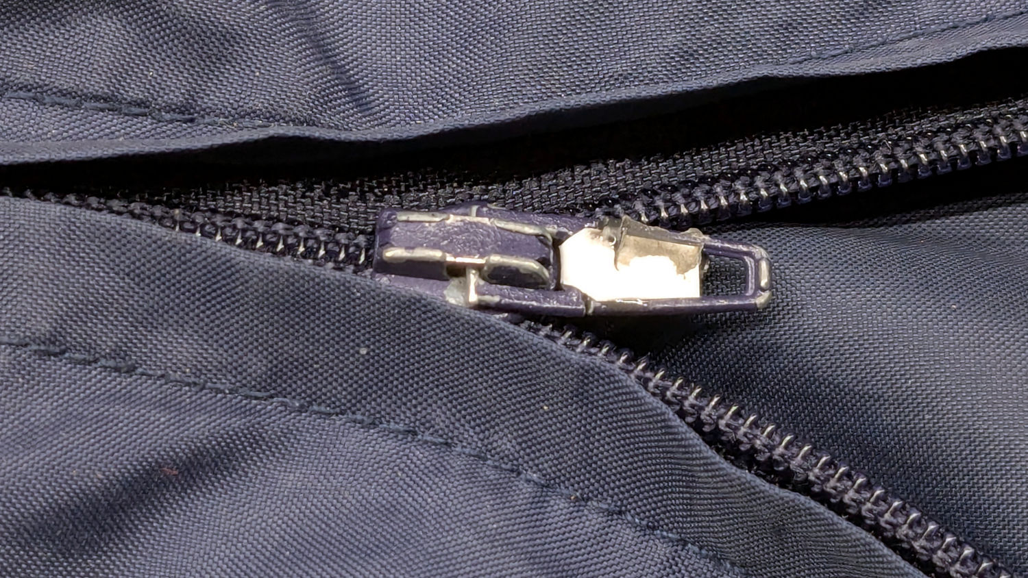Wind Pants Zipper Tab - repaired