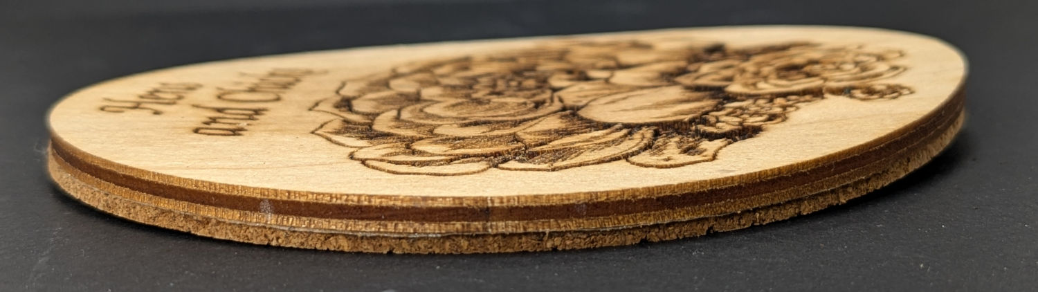 Warped plywood coaster - side