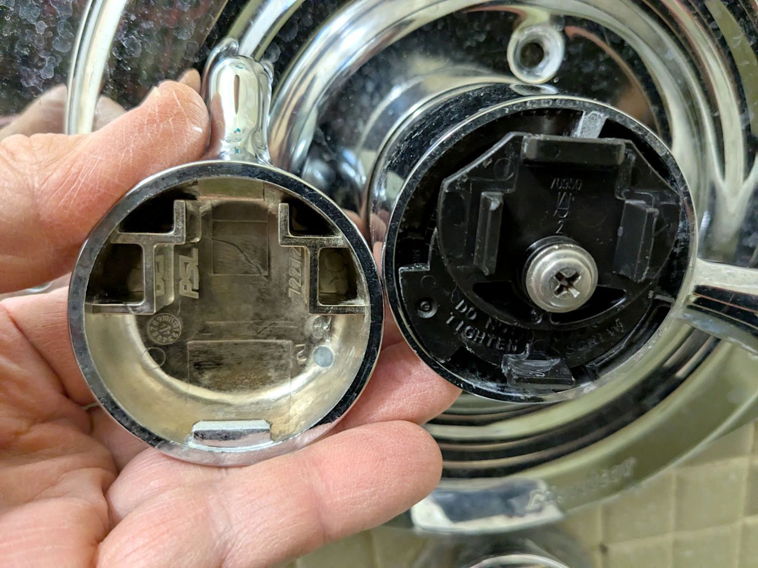 Delta bath faucet cap latches