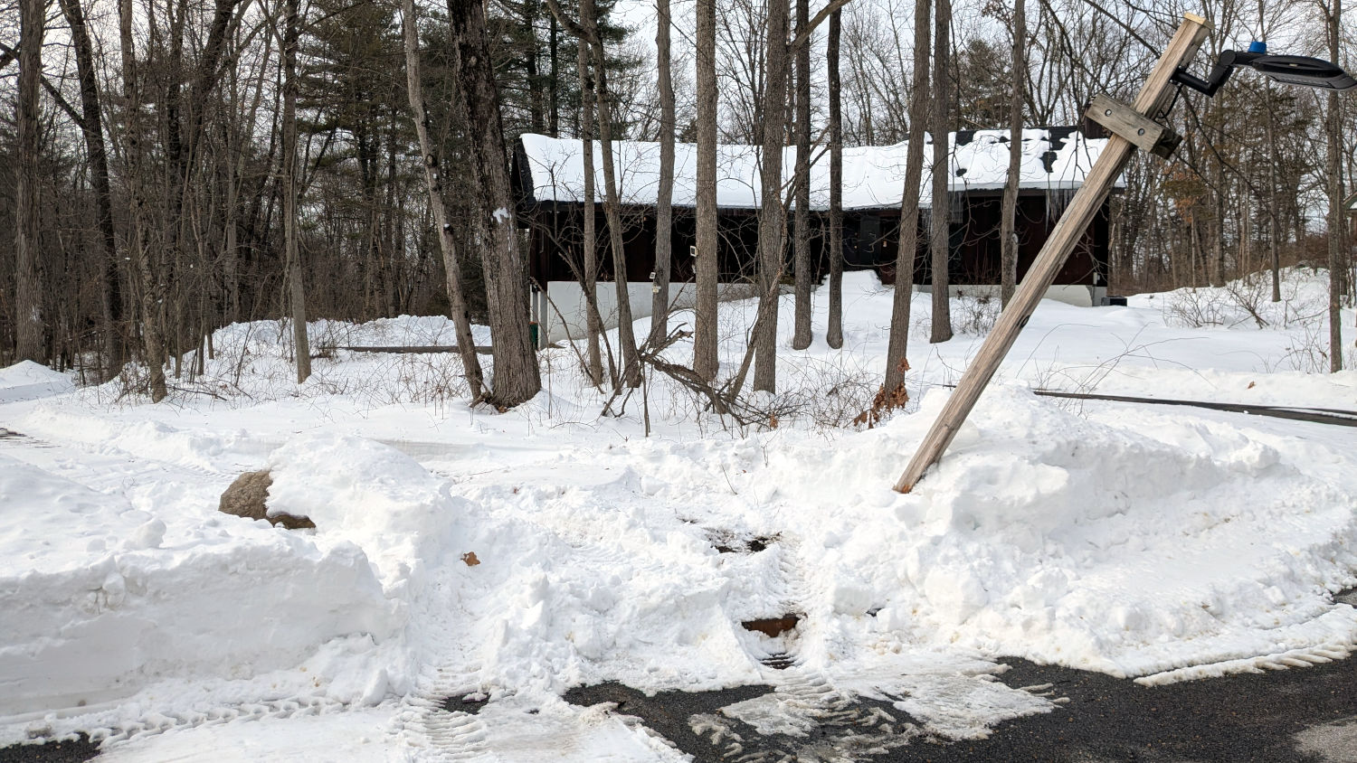 Damaged pole - snow tracks