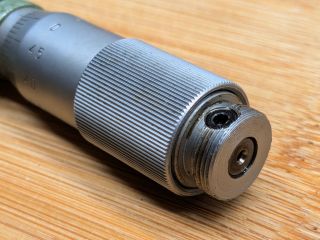 Metric Micrometer: Percussive Adjustment
