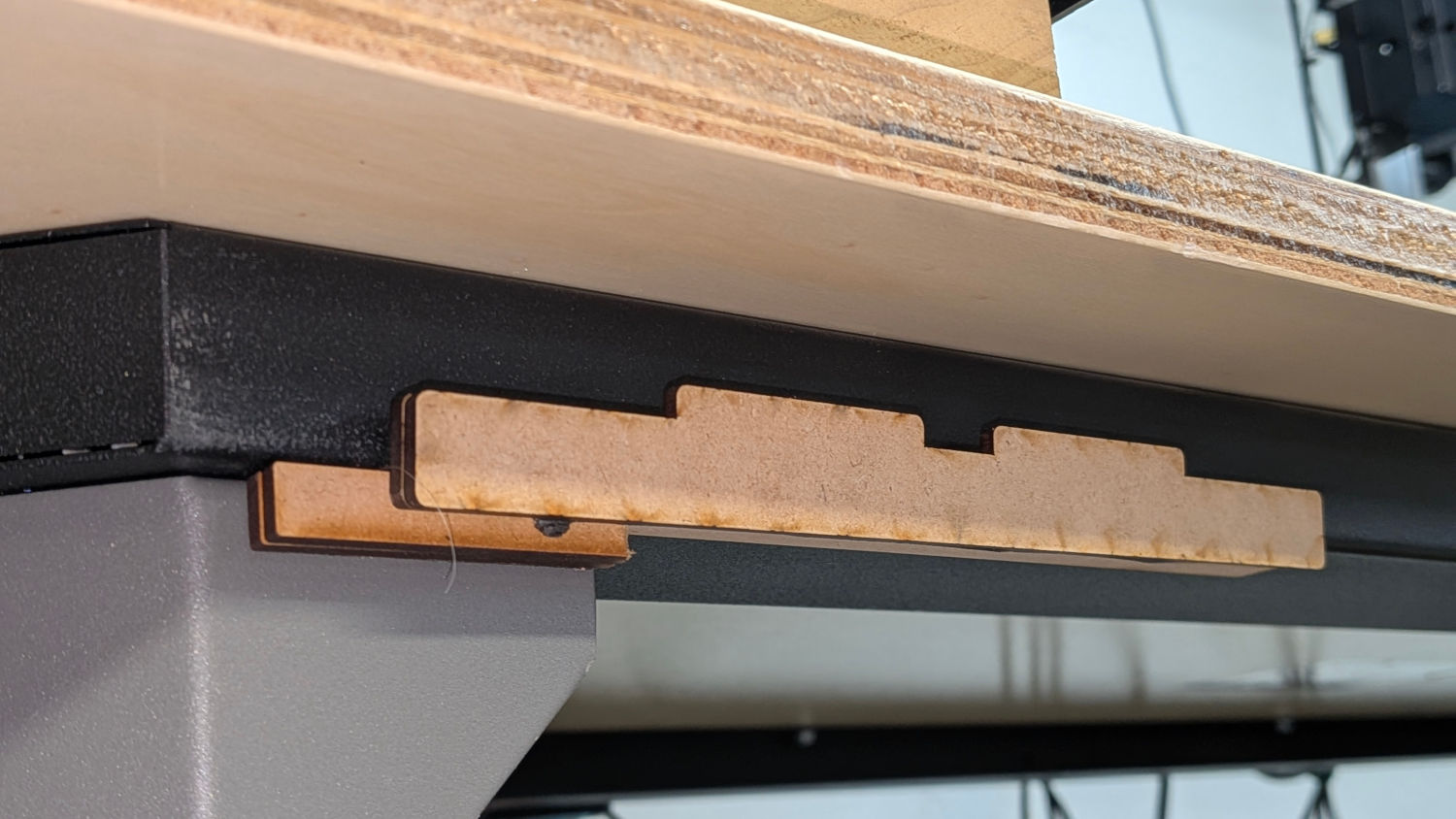 Workbench scrap can hanger