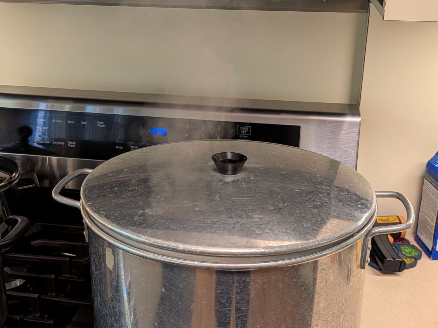Canning pot lid handle - in use