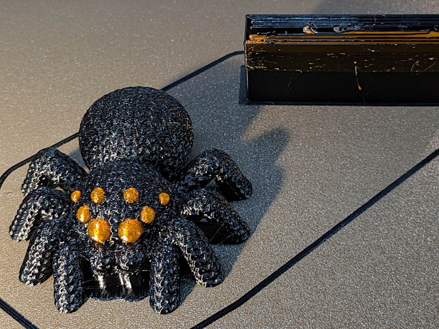 Knitted Spider - 8 eyes - on platform